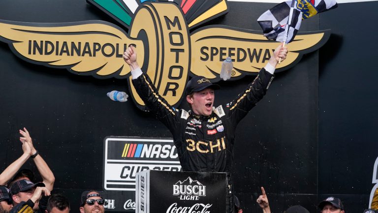 Tyler Reddick celebrates after winning a NASCAR Cup Series auto race at Indianapolis Motor Speedway, Sunday, July 31, 2022, in Indianapolis. (Darron Cummings/AP)