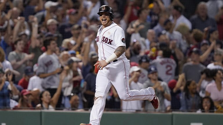 Boston Red Sox's Christian Vazquez celebrates as he arrives at home plate to score on a two-run home run hit by J.D. Martinez in the fifth inning of a baseball game against the New York Yankees, Sunday, July 10, 2022, in Boston. (Steven Senne/AP)