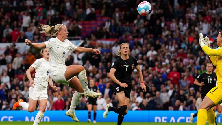 England's Beth Mead scores the opening goal during the Women's Euro 2022 soccer match between England and Austria at Old Trafford in Manchester, England, Wednesday, July 6, 2022. (Martin Rickett/PA via AP)