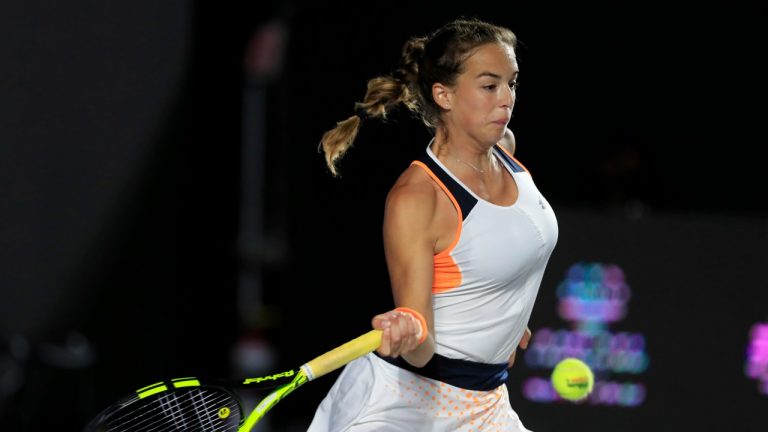 Lucia Bronzetti of Italy returns the ball to Marie Bouzkova of the Czech Republic during a women's tennis match at Abierto of Zapopan tennis tournament in Guadalajara, Mexico, Wednesday, Feb. 23, 2022. (Refugio Ruiz/AP)