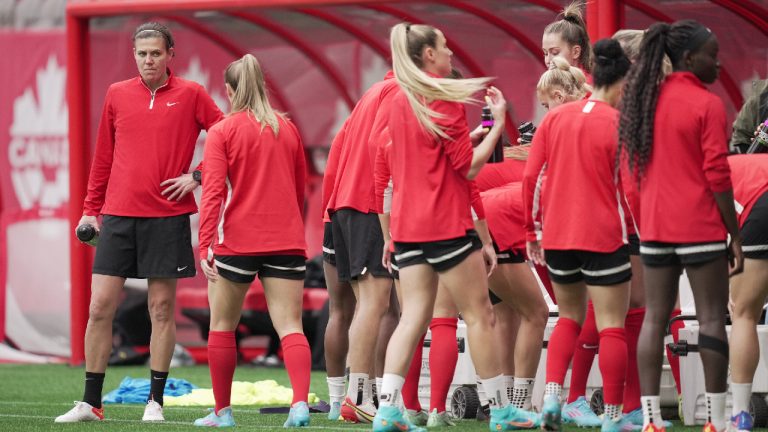 Canada's women's national soccer team captain Christine Sinclair, left, takes a break during team practice ahead of two friendly matches against Nigeria, in Vancouver, B.C., Thursday, April 7, 2022. (Darryl Dyck/CP)