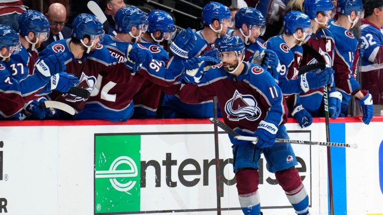 Colorado Avalanche center Andrew Cogliano (11) is congratulated for a goal against the Edmonton Oilers during the second period in Game 1 of the NHL hockey Stanley Cup playoffs Western Conference finals Tuesday, May 31, 2022, in Denver. (Jack Dempsey/AP)