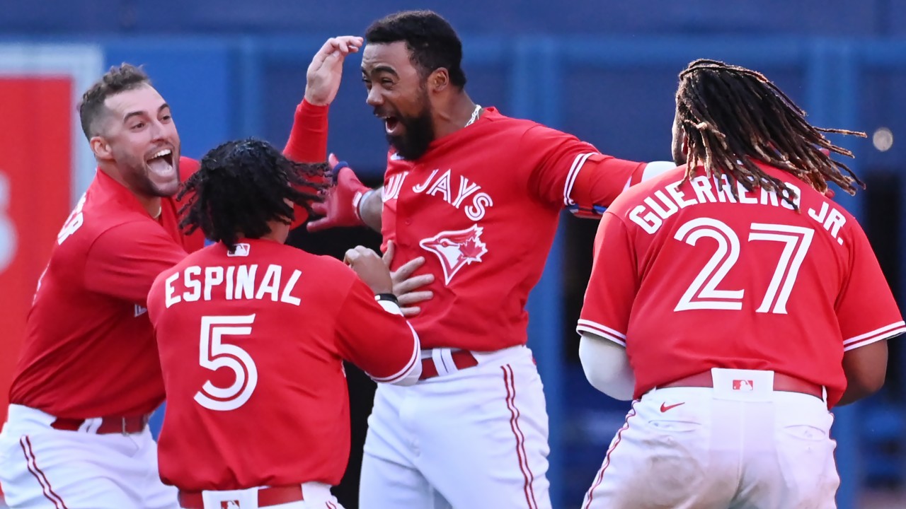 Blue Jays' Santiago Espinal, a gamer with a signature smile, wants