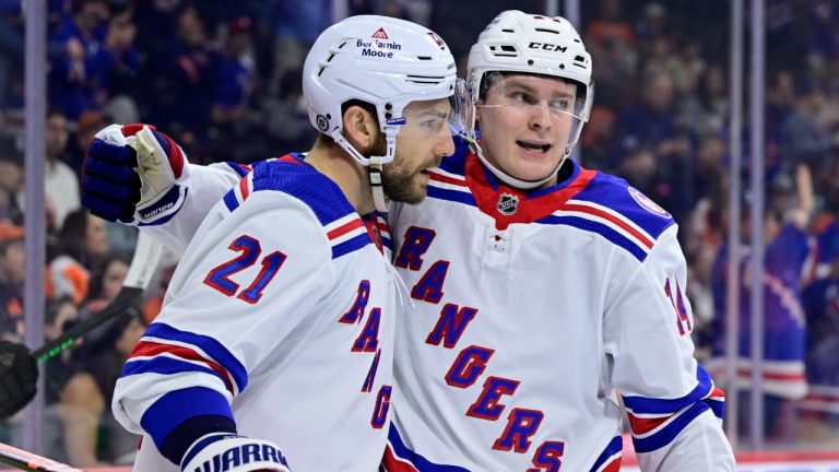 New York Rangers' Kaapo Kakko, right, celebrates with Barclay Goodrow after Kakko scored a goal against the Philadelphia Flyers during the first period of an NHL hockey game Wednesday, April 13, 2022, in Philadelphia. (Derik Hamilton/AP)