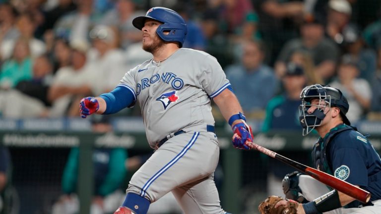 Toronto Blue Jays' Alejandro Kirk watches as he lines out to Seattle Mariners left fielder Adam Frazier during the eighth inning of a baseball game Thursday, July 7, 2022, in Seattle. (Ted S. Warren/AP)