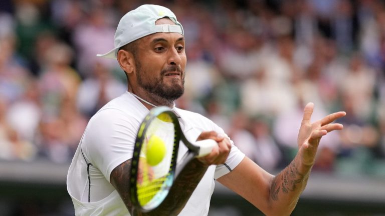 Australia's Nick Kyrgios returns to Brandon Nakashima of the US in a men's singles fourth round match on day eight of the Wimbledon tennis championships in London, Monday, July 4, 2022. (Alberto Pezzali/AP)