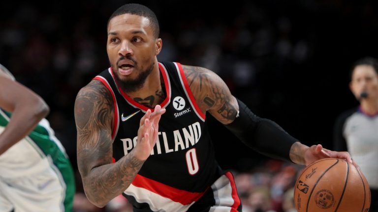 Portland Trail Blazers guard Damian Lillard drives during the first half of the team's NBA basketball game against the Dallas Mavericks in Portland, Ore., Monday, Dec. 27, 2021. (Amanda Loman/AP)