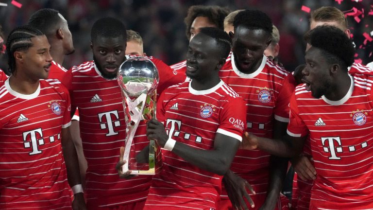 Bayern's Sadio Mane, front center, and his teammates celebrate winning the German Supercup 2022 soccer match between German soccer cup winner RB Leipzig and German Bundesliga soccer champion FC Bayern Munich in Leipzig, Germany, Saturday, July 30, 2022. (Michael Sohn/AP)