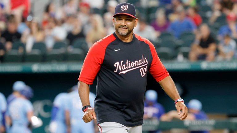 Washington Nationals manager Dave Martinez walks toward the dugout after making a pitching change during the seventh inning of a baseball game against the Texas Rangers Sunday, June 26, 2022, in Arlington, Texas. (Michael Ainsworth/AP)