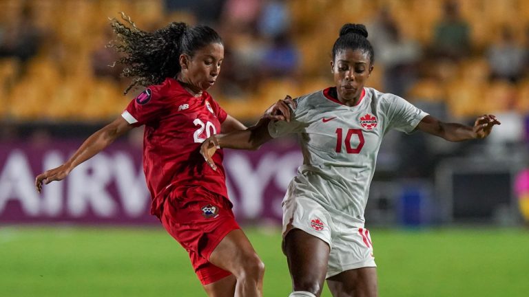 Panama's Schiandra Gonzalez, left, and Canada's Ashley Lawrence battle during a CONCACAF Women's Championship soccer match in Monterrey, Mexico, Friday, July 8, 2022. (Fernando Llano/AP Photo)