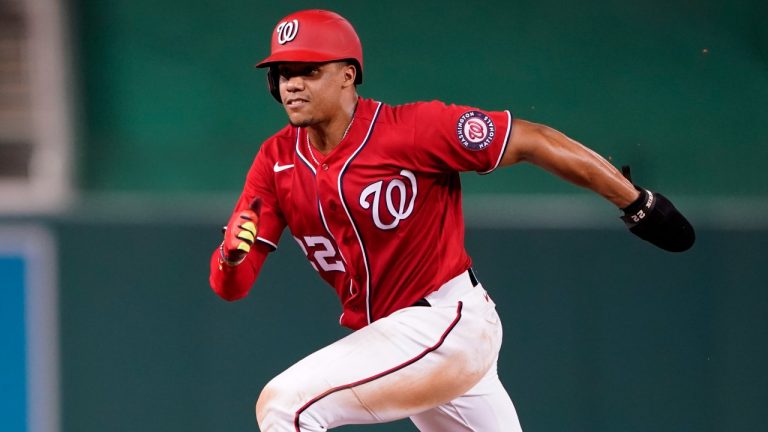 Washington Nationals' Juan Soto rounds third base before scoring on Nelson Cruz's single in the eighth inning of a baseball game against the Atlanta Braves, Thursday, July 14, 2022, in Washington. (Patrick Semansky/AP)