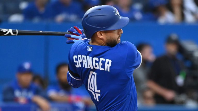 Toronto Blue Jays' centre fielder George Springer (4) hits a single in the first inning of American League baseball action against the Baltimore Orioles in Toronto on Monday, June 13, 2022. (Jon Blacker/CP)