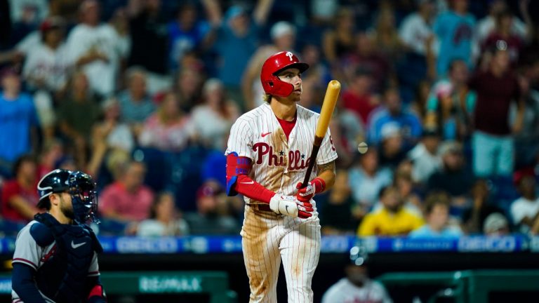 Philadelphia Phillies' Bryson Stott follows the flight of his three-run home run off Atlanta Braves' A.J. Minter during the eighth inning of a baseball game, Monday, July 25, 2022, in Philadelphia. (Matt Rourke/AP)