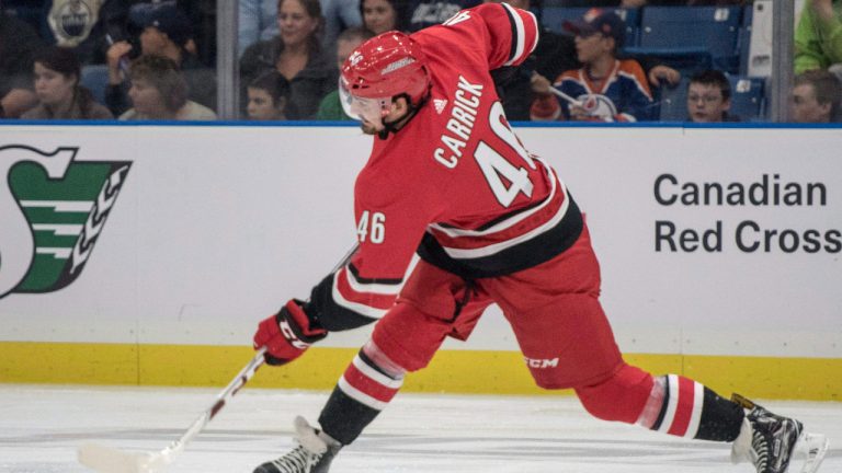 Carolina Hurricanes defenceman Trevor Carrick takes a shot against the Edmonton Oilers during the second period of NHL pre-season action in Saskatoon, Sask. Wednesday, September 27, 2017. (Liam Richards/CP)