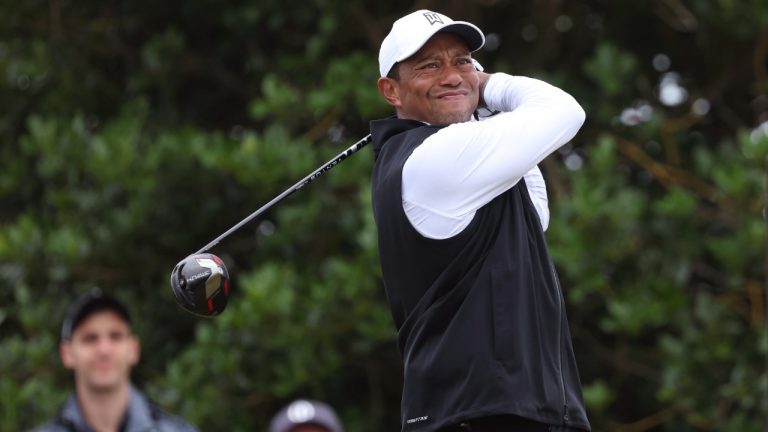 Tiger Woods of the US plays off the 3rd tee during the second round of the British Open golf championship on the Old Course at St. Andrews, Scotland, Friday July 15, 2022. (Peter Morrison/AP)