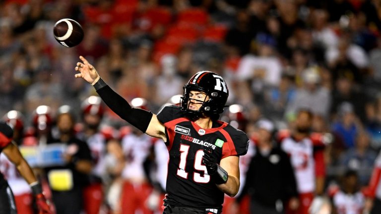 Ottawa Redblacks quarterback Nick Arbuckle (19) throws the ball during second half CFL football action against the Calgary Stampeders in Ottawa on Friday, Aug. 5, 2022. (Justin Tang/THE CANADIAN PRESS)