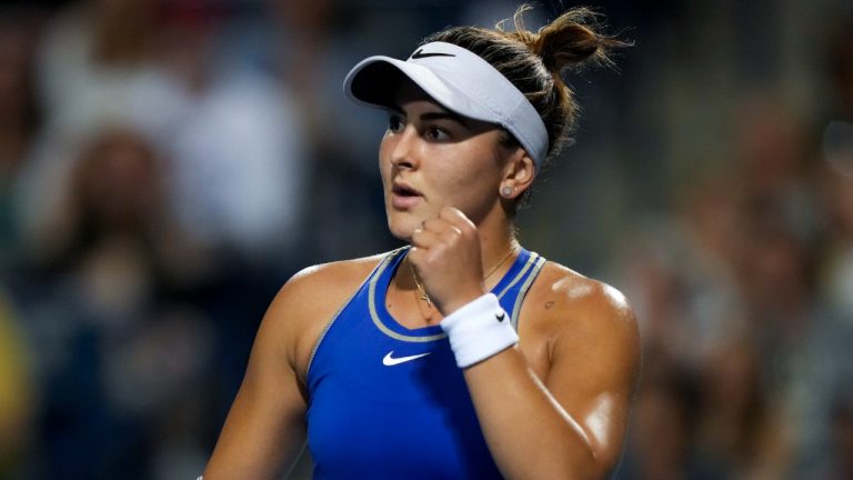 Bianca Andreescu, of Canada, reacts after winning a set against Alize Cornet, of France, during the National Bank Open tennis tournament in Toronto on Wednesday, August 10, 2022. (Nathan Denette/CP)