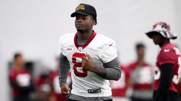 Washington Commanders running back Brian Robinson (8) runs during practice at the team's NFL football training facility, Thursday, Aug. 4, 2022 in Ashburn, Va. (AP Photo/Nick Wass)