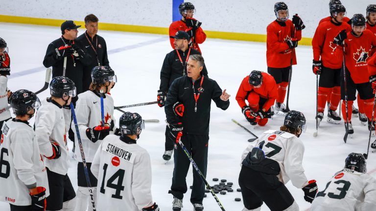 Canada’s National Junior Team head coach Dave Cameron gives instructions during a training camp practice in Calgary, Tuesday, Aug. 2, 2022. (Jeff McIntosh/CP)