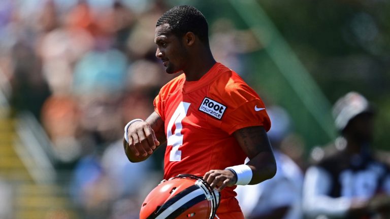 Cleveland Browns quarterback Deshaun Watson walks during an NFL football practice in Berea, Ohio, Saturday, July 30, 2022. (David Dermer/AP)