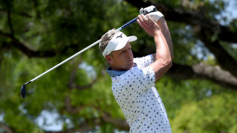 Luke Donald, of England, watches his tee shot on the seventh hole during the third round of the Charles Schwab Challenge golf tournament at the Colonial Country Club, Saturday, May 28, 2022, in Fort Worth, Texas. (Emil Lippe/AP)