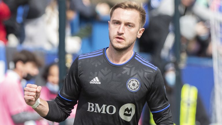 CF Montreal's Djordje Mihailovic celebrates after scoring against the Vancouver Whitecaps during first half MLS soccer action in Montreal, Saturday, April 16, 2022. (Graham Hughes/CP)