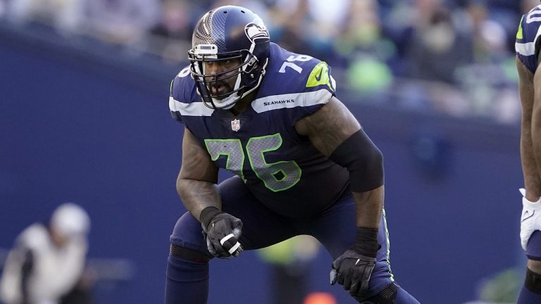 FILE - Seattle Seahawks offensive tackle Duane Brown (76) gets set during an NFL football game against the Jacksonville Jaguars, Oct. 31, 2021, in Seattle. Brown will get to see his former team for the first time since getting traded to Seattle when the Seahawks visit Houston on Sunday, Dec. 12, 2021. (Ted S. Warren, File/AP)