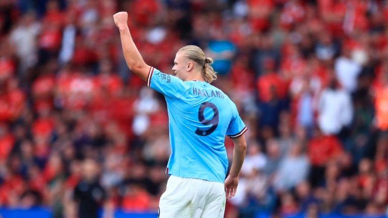 Manchester City's Erling Haaland celebrates after his teammate Julian Alvarez scores his side's opening goal during the FA Community Shield soccer match between Liverpool and Manchester City at the King Power Stadium in Leicester, England, Saturday, July 30, 2022. (Leila Coker/AP)