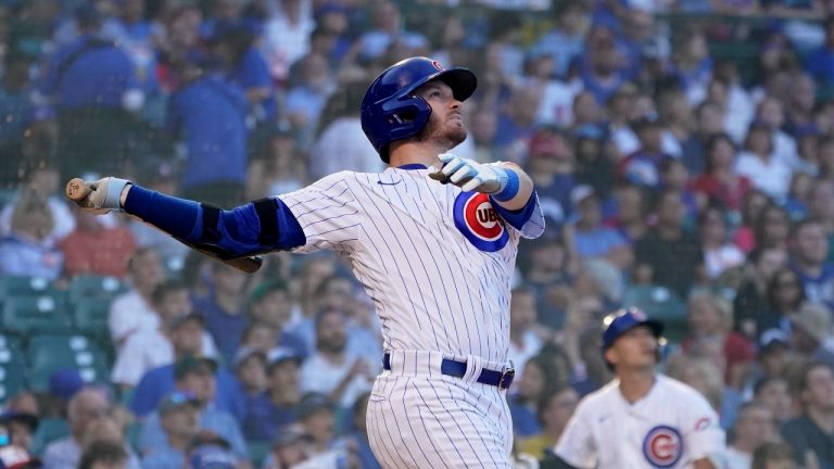 Chicago Cubs' Ian Happ watches his home run off Baltimore Orioles starting pitcher Jordan Lyles during the first inning of a baseball game Tuesday, July 12, 2022, in Chicago. (Charles Rex Arbogast/AP Photo)