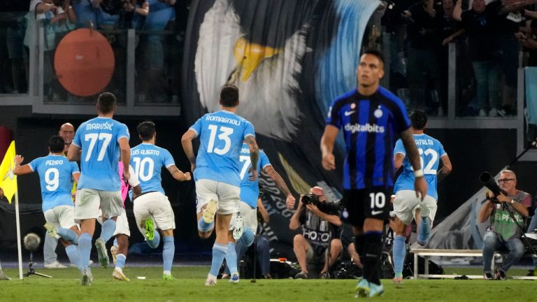 Lazio's Luis Alberto, third left, celebrates with teammates after scoring his side's second goal during the Italian Serie A soccer match between Lazio and Inter Milan at Rome's Olympic Stadium, Friday, Aug. 26, 2022. (AP Photo/Gregorio Borgia)