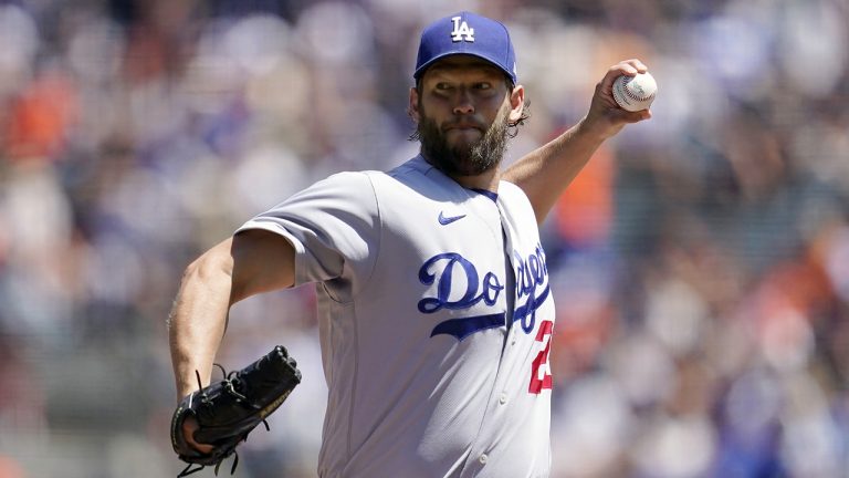 Los Angeles Dodgers' Clayton Kershaw pitches against the San Francisco Giants during the first inning of a baseball game in San Francisco, Thursday, Aug. 4, 2022. (Jeff Chiu/AP)