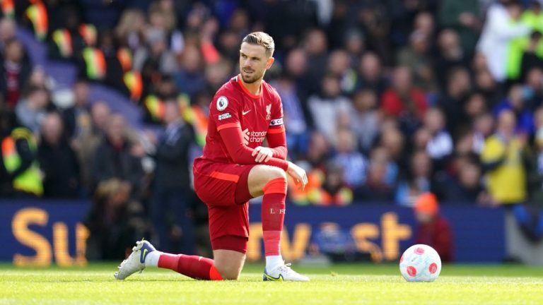 Liverpool's Jordan Henderson takes a knee prior to the Premier League match at the AMEX Stadium, Brighton. Picture date: Saturday March 12, 2022. (AP Photo)