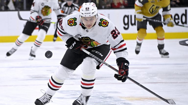 Chicago Blackhawks centre Philipp Kurashev (23) skates for the puck during the third period of the team's NHL hockey game against the Vegas Golden Knights on Saturday, Jan. 8, 2022, in Las Vegas. (David Becker/AP)