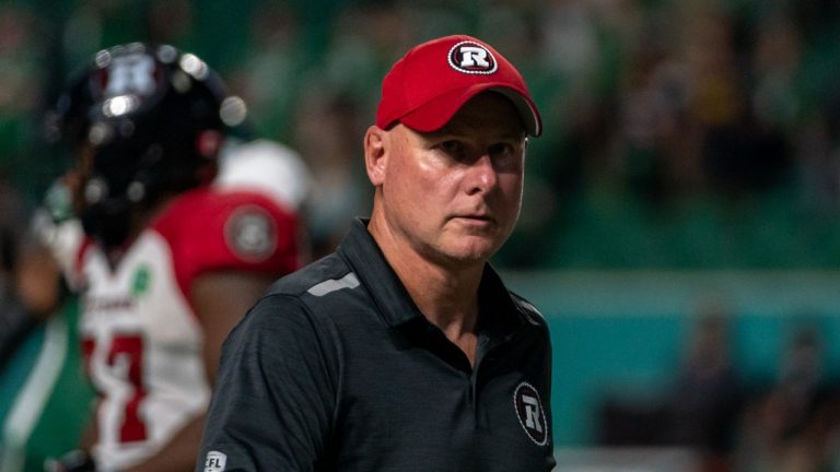 Ottawa Redblacks head coach Paul LaPolice walks off the field after CFL football action against the Saskatchewan Roughriders in Regina, Friday, July 8, 2022. (Heywood Yu/THE CANADIAN PRESS)