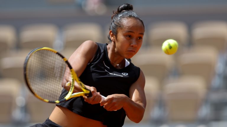 Canada's Leylah Fernandez plays a shot against Italy's Martina Trevisan during their quarterfinal match at the French Open tennis tournament in Roland Garros stadium in Paris, France, Tuesday, May 31, 2022. (Jean-Francois Badias/AP)