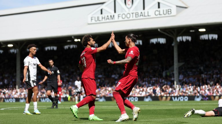 Liverpool's Darwin Nunez, right, celebrates with teammate Liverpool's Mohamed Salah after scoring during the English Premier League soccer match between Fulham and Liverpool at Craven Cottage stadium in London, Saturday, Aug. 6, 2022. (Ian Walton/AP)