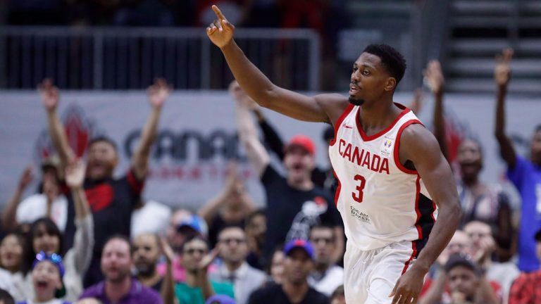 Canada's Melvin Ejim celebrates scoring against Dominican Republic during their FIBA Basketball World Cup Qualifier. (Mark Blinch/CP)