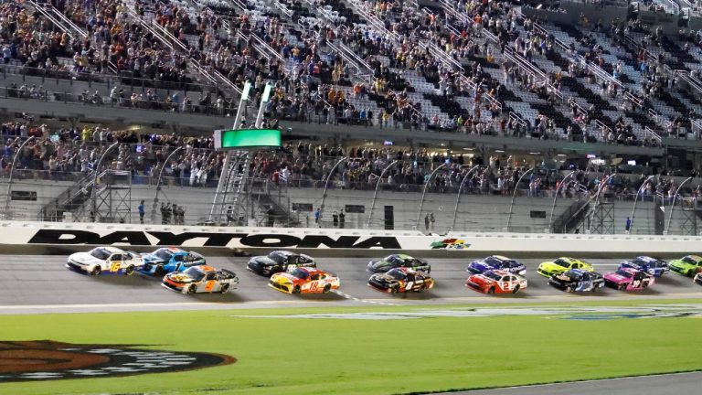 A J Allmendinger (16) leads drivers through the front stretch at the start of a NASCAR Xfinity Series auto race at Daytona International Speedway, Friday, Aug. 26, 2022, in Daytona Beach, Fla. (Terry Renna/AP)