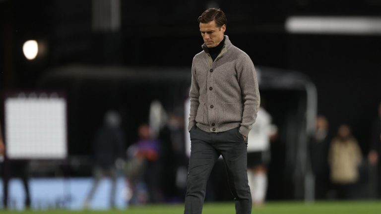 Fulham's manager Scott Parker walks on the field after the English Premier League soccer match between Fulham and Burnley at the Craven Cottage Stadium in London. (Clive Rose/Pool via AP)