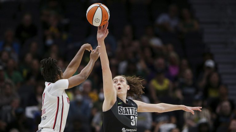 Seattle Storm forward Breanna Stewart (30) blocks a shot from Washington Mystics guard Ariel Atkins (7) during the second half of Game 1 of a WNBA basketball first-round playoff series Thursday, Aug. 18, 2022, in Seattle. The Storm won 86-83. (Lindsey Wasson/AP)