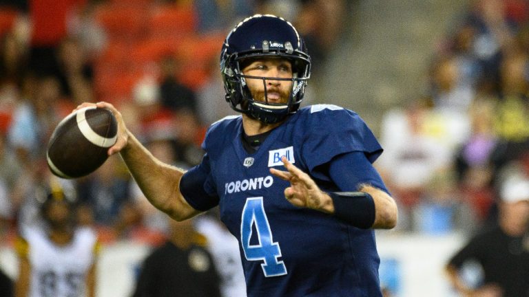 Toronto Argonauts quarterback McLeod Bethel-Thompson (4) throws the ball in the first half against the Hamilton Tiger-Cats in Toronto. (Christopher Katsarov/CP)