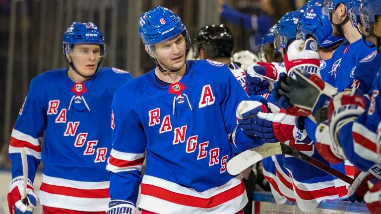 New York Rangers defenceman Jacob Trouba (8) celebrates with his teammates after scoring a goal during the first period of an NHL hockey game against the Philadelphia Flyers, Wednesday, Dec. 1, 2021, at Madison Square Garden in New York. (Mary Altaffer/AP)