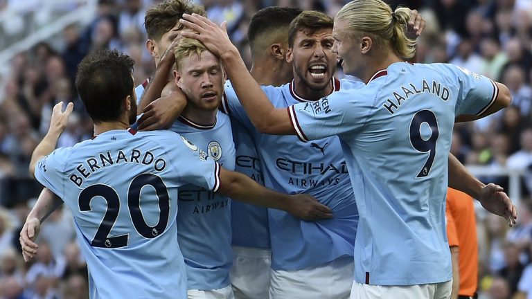 Manchester City's Bernardo Silva, left, celebrates with teammates after scoring his sides third goal during the English Premier League soccer match between Newcastle United and Manchester City at St James Park in Newcastle, England, Sunday, Aug.21, 2022. (Rui Vieira/AP)