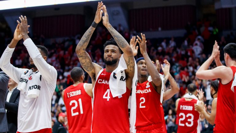 Nickeil Alexander-Walker (4) and teammates applaud the crowd after their FIBA international men's World Cup basketball qualifying game victory over Dominican Republic, in Hamilton, Ont., Friday, July 1, 2022. (Cole Burston/CP)