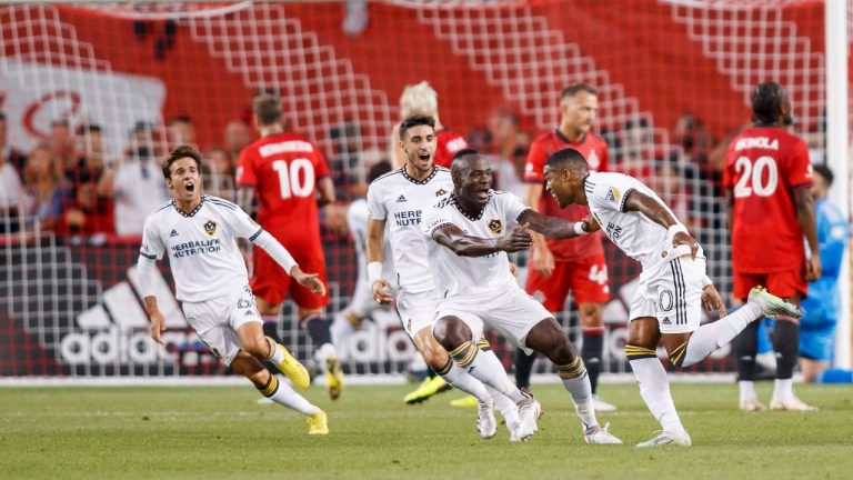 Los Angeles Galaxy forward Douglas Costa (10) and teammates celebrate his goal during first half MLS soccer action against the Toronto FC in Toronto on Wednesday, Aug. 31, 2022. (Cole Burston/CP)