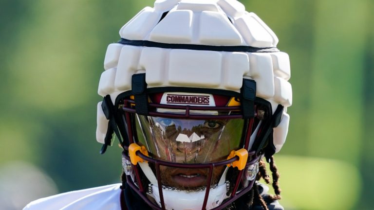 Washington Commanders running back Jonathan Williams wears a Guardian Cap football helmet during practice at the team's NFL football training facility, Wednesday, July 27, 2022 in Ashburn, Va. (Alex Brandon/AP)