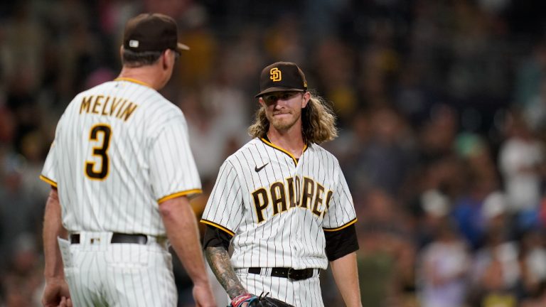 San Diego Padres relief pitcher Josh Hader, right, looks at manager Bob Melvin as Hader is removed during the ninth inning of the team's baseball game against the San Francisco Giants, Tuesday, Aug. 9, 2022, in San Diego. (Gregory Bull/AP)