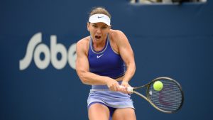 Simona Halep of Romania returns the ball during a match against Donna Vekic of Croatia, during the National Bank Open tennis tournament in Toronto, on Monday, Aug. 8, 2022. (Christopher Katsarov/CP)