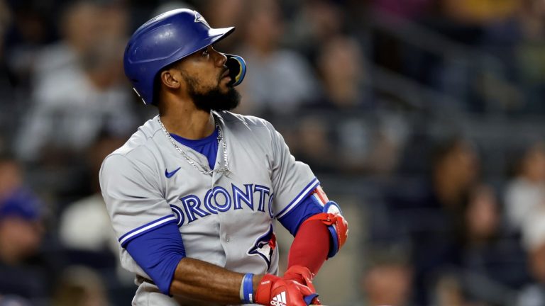 Toronto Blue Jays' Teoscar Hernandez watches his two-run home run during the fourth inning of the team's baseball game against the New York Yankees on Friday, Aug. 19, 2022, in New York. (Adam Hunger/AP)