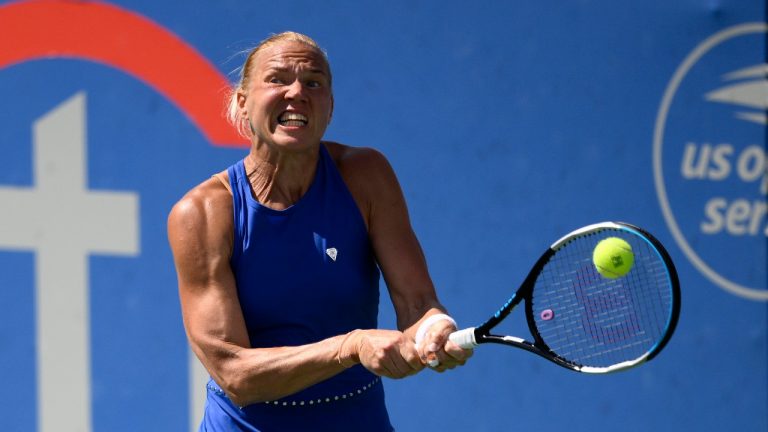 Kaia Kanepi, of Estonia, returns a shot against Daria Saville, of Australia, during a match at the Citi Open tennis tournament Saturday, Aug. 6, 2022, in Washington. (Nick Wass/AP)